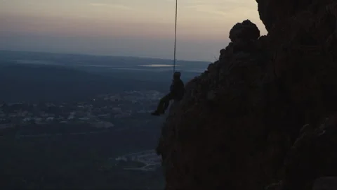 A Man Abseiling In Dark Stock Footage 275480476