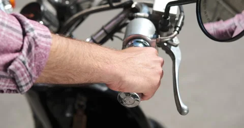 Man accelerating motorcycle on road Video stock 136354791