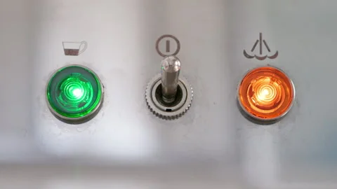 A man activates an espresso machine, ready to brew the perfect cup of coffee in  Stock Footage 281600484