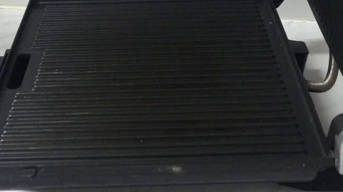 Man Ad Halloumi on Grill Video stock 120740108