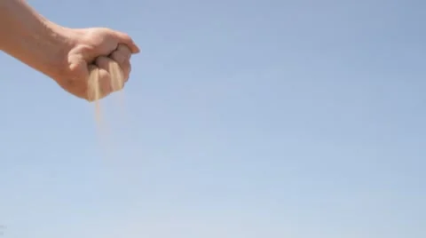 Man adding sand in a heap with his hand Video stock 61284839