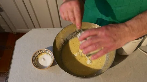 Man Adding a Sour Cream to Liquid Dough Homemade Bakery People Are Cooking at Stock Footage 59118896