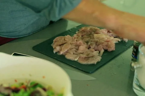 Man adding spices on chicken  Stock-Footage 43264432