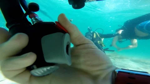 Man adjust aqualung while underwater Stock-Footage 102086219