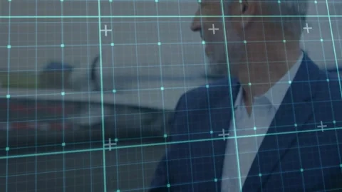 Man adjusting cuff while preparing for departure at airport, cyan grid tracking Video stock 331062244