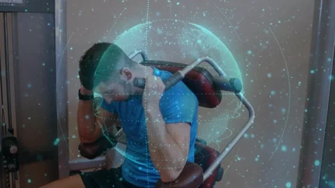 Man adjusting grip and pushing arm pads, training shoulder while teal sphere Stock Footage 330713356
