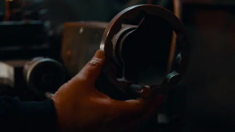 A Man adjusting a machine Stock Footage 275445212