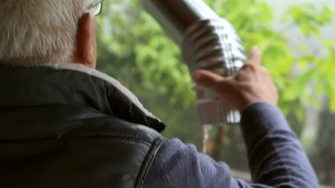 Man Adjusting Rain Gutter Downspout For Rainwater Harvest. Stock Footage 109283320