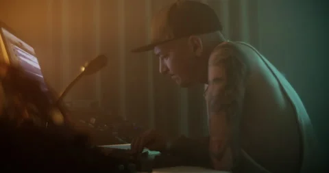 Man adjusting sound while composing music in studio Stock Footage 249913082