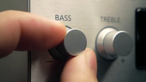 The man adjusts the bass Видео 84479297