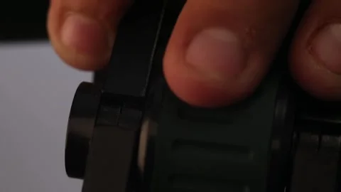 Man adjusts binoculars Stock-Footage 93546514