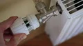 Man adjusts the temperature of the battery HD Footage