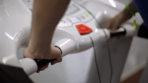 Man adjusts the treadmill Stock Footage 99798675