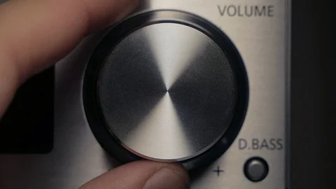 The man adjusts the volume Stock Footage 84479411