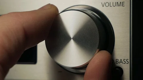 The man adjusts the volume Stock Footage 84479468