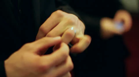 Man Adjusts Wedding Ring Stock Footage 22855123