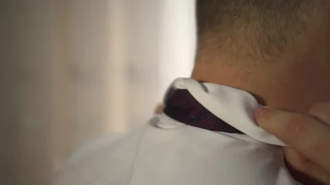 Man Adjusts White Collar and Tie Stock Footage 168313348