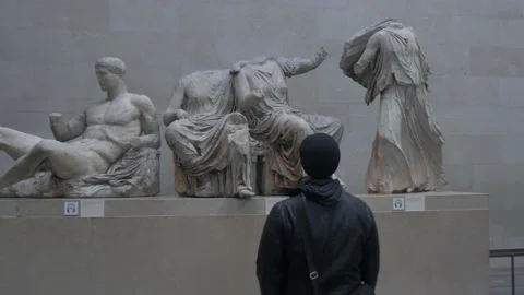Man Admires The Parthenon Marbles Inside The British Museum In London Video stock 154155937