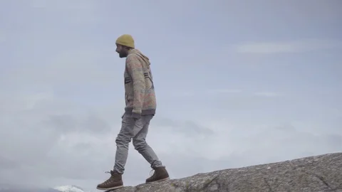 Man admiring the scenic view from the cliff Video stock 85830833