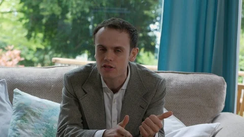 Man aggresively talking to camera about sales from home Stock Footage 89921929