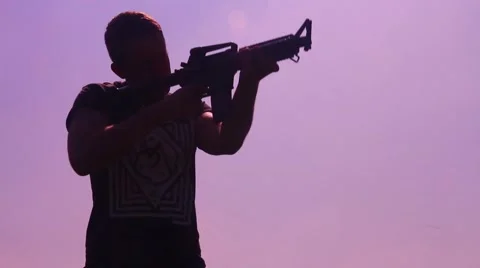 Man aim M4 in silhouette Stock Footage 48897638
