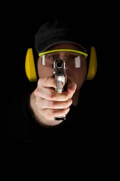 A Man Aiming A Gun Фото