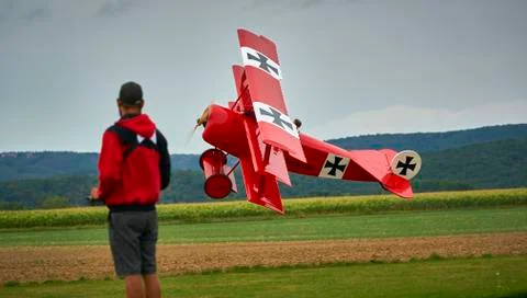 Man with an aircraft model Stock Photos