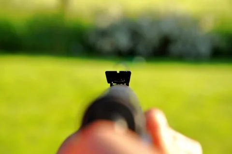Man with airgun Stock Photos