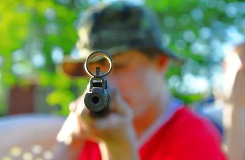 Man with airgun Foto stock