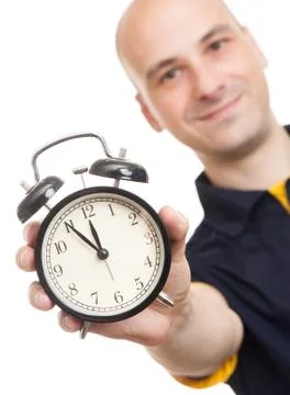 Man with an alarm clock Stock Photos