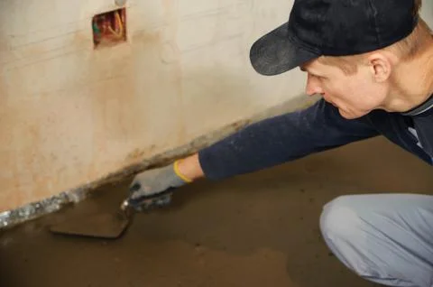 Man aligns  concrete Stock Photos