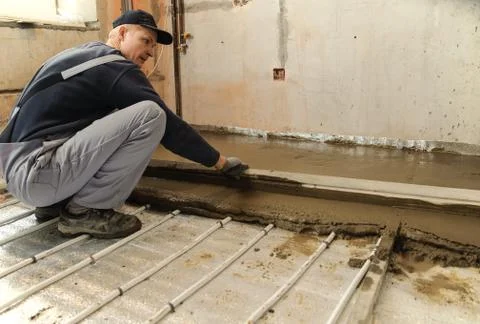 Man aligns  concrete Stock Photos