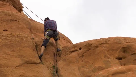 Man Almost Gets Hurt During Rock Climbing Descent Stock-Footage 78991828