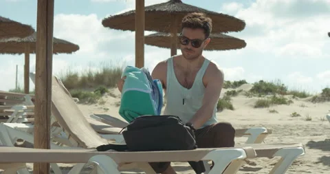 Man alone on the beach Stock Footage 205026934