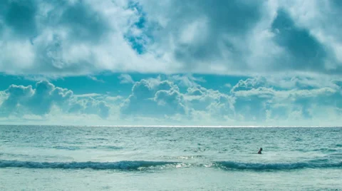Man Alone in Bermuda Triangle Ocean with Majestic Clouds Stock Footage 36985646
