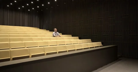 Man alone in the classroom during the epidemic pandemic Video stock 134178419