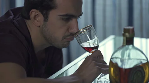  man alone is drunk drinking red wine 스톡 동영상 68940856