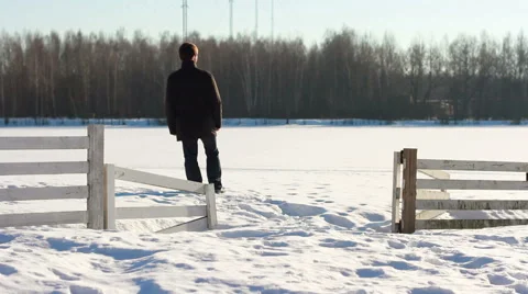 Man alone in the snowy world Stock Footage 60235225