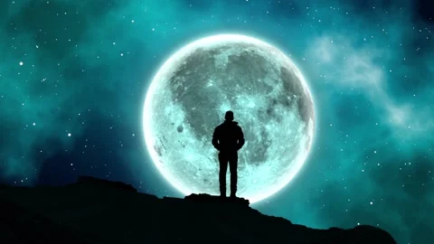 A man alone standing on a hill staring at the full moon bulan Stock Footage 157377310