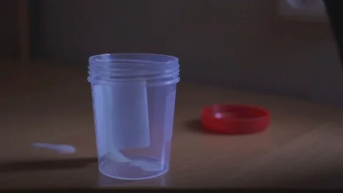 Man with the analysis of semen. Sperm donation at the clinic. concept of Stock Footage 90150739