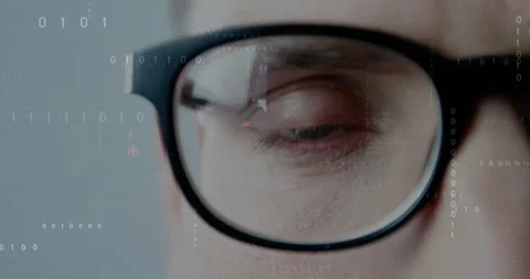 Man analyzing data behind glasses in tech lab, with floating binary digits and Video stock 326765403