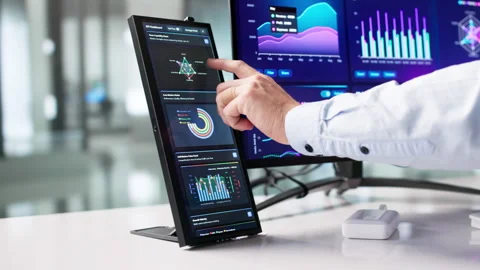 Man Analyzing Financial Data On Computer In Office Stock Footage 328391738