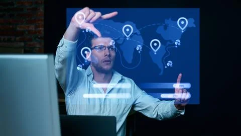 Man analyzing interactive global logistics map on holographic display. Collage Foto stock