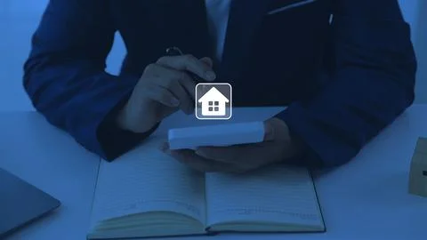 Man Analyzing Property Valuation Report Stock Photos