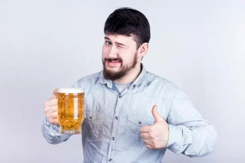 Man and beer Stock Photos