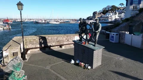 Man and Boy Monument in Brixham Harbour from a drone, Brixam, Torbay, Devon, UK 動画素材 227729233
