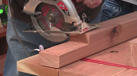 Man and boy sawing Stock Footage 22823012