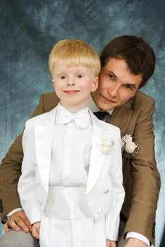 Man and boy in suits Foto stock