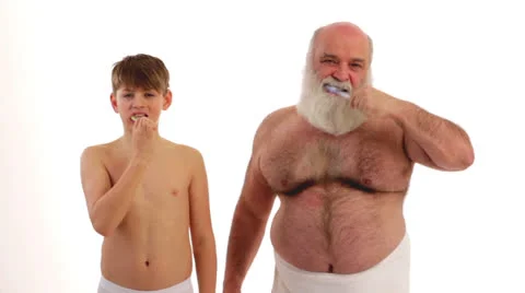 Man and boy toothbrush 2 Stock Footage 24634627