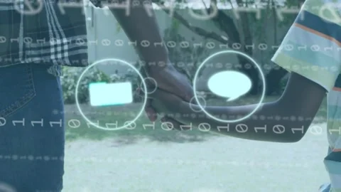 Man and boy walking path handhold starting pulsing tech icons and binary fading Stock Footage 333449305
